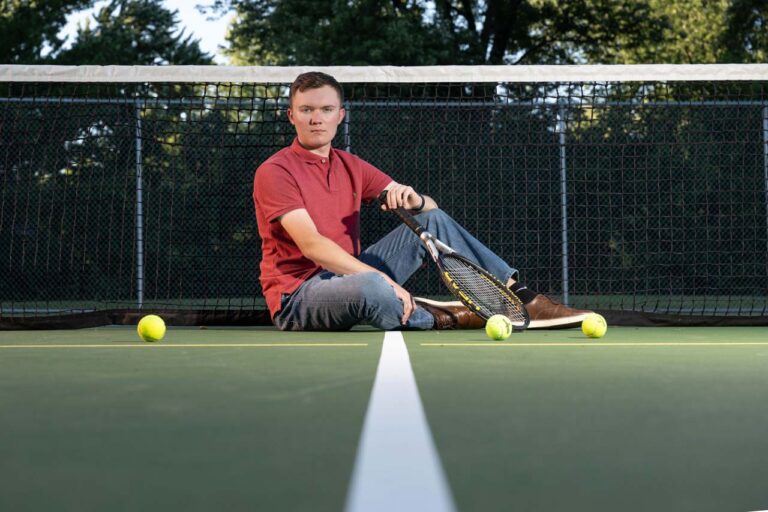 High school senior boy picture with tennis balls