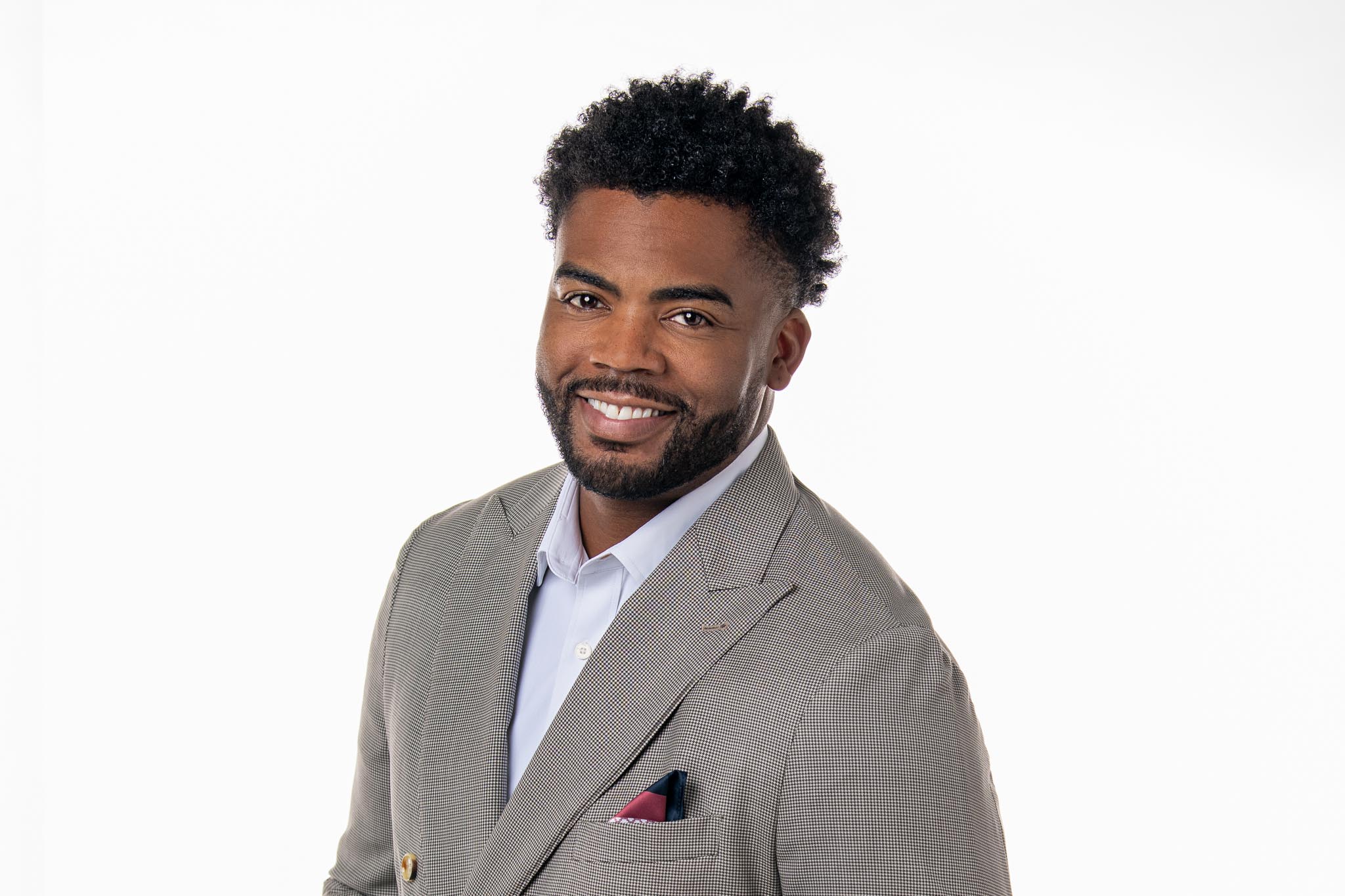 _DSC7938-Edit Business headshot of African American male executive on white background